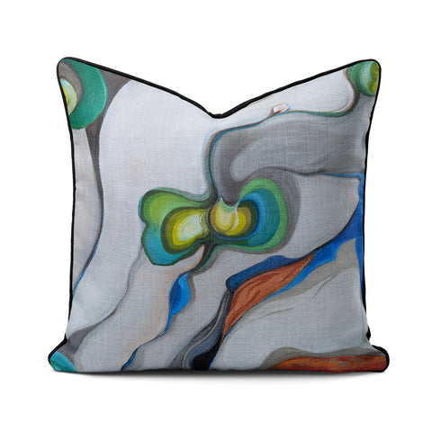 Decorative pillow with abstract design on a white background